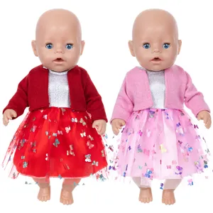 Detailed shot of 45cm fashion baby doll set with knitted cardigan and sparkly butterfly dress.
