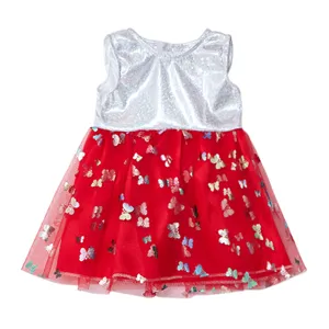 Close-up detail of the 18-inch doll red tulle dress with shiny silver top and butterfly sequins.