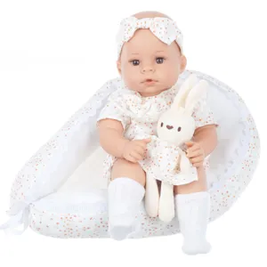 18 inch reborn baby doll set with floral dress, headband, socks and cute bunny plush toy.