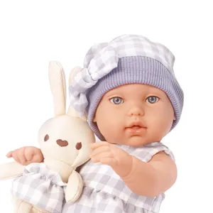 12-inch realistic reborn baby doll with purple plaid hat and dress, holding cute plush rabbit toy.
