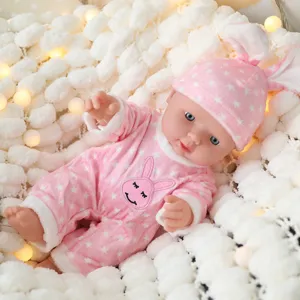 Bambola bebè in vinile da 30 cm con cappello da coniglietto rosa e tutina, gioco morbido.