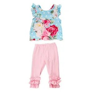 Completo abbigliamento per bambola da 18 pollici, top floreale blu e pantaloni rosa.