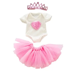 Detailed view of 18 inch doll clothing set featuring pink tutu skirt and rose onesie.