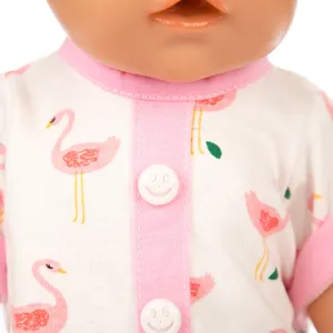 Detailed close-up of 18 inch doll romper featuring cute pink flamingo pattern and smiley buttons.