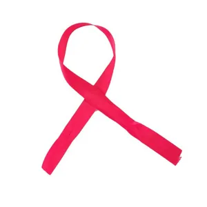 Detailed view of pink ribbon, smooth fabric texture, awareness ribbon shape for crafts.