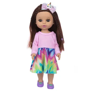 14-Zoll braunes Haar Vinyl Puppe Detail, rosa Oberteil und bunter Rock, Einhorn Schleife.