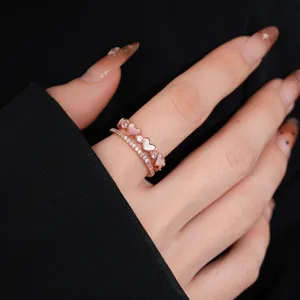 Exquisite double layer heart ring with mother of pearl and cubic zirconia details.