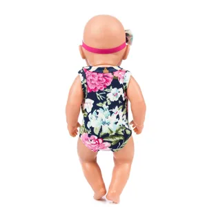 Detailed view of 43cm doll floral romper and pink headband set, cute baby doll outfit accessory.
