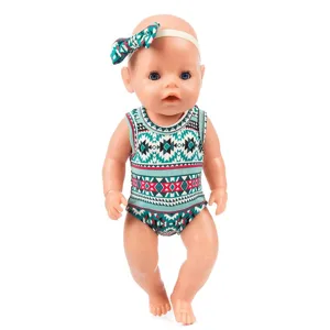 Detailed view of the 43cm doll romper and matching headband with geometric print design.