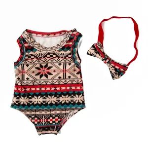 Doll clothes detail view, Nordic snowflake pattern sleeveless romper and matching headband.