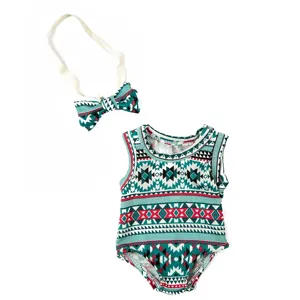 Detailed view of doll clothing set geometric print sleeveless romper and matching bow headband.