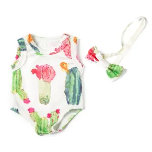 Detailed view of cute cactus print doll romper and matching bow set for 18 inch fashion dolls.