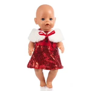 Detailed close-up of a 43cm baby doll wearing a festive red sequin dress and white fur shawl.