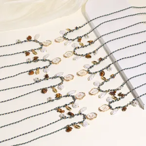Bohemian woven pearl seashell anklet with initial letter charms for summer beach vacation.
