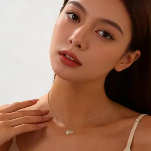 Dainty heart pendant necklace with key charm for women, elegant clavicle chain jewelry gift.