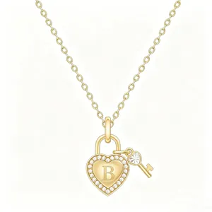 Close-up view of the gold heart lock necklace detail, featuring sparkling pave crystals.