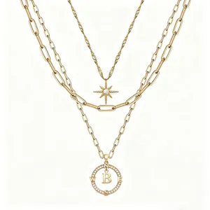 Collana multistrato dorata con ciondolo a stella e bussola con lettera per donne moda.