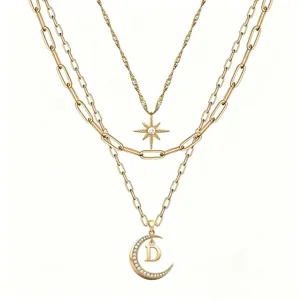 Multi-layer gold chain necklace featuring crystal star and moon D letter pendants for women.