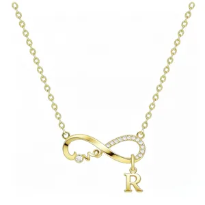 Collana infinito amore oro con cristallo e ciondolo lettera R, dettaglio catena elegante.