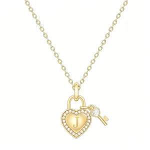 Gold heart lock and key pendant necklace with letter J and sparkling crystals for women