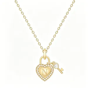 Close-up of gold heart padlock pendant necklace with initial N and sparkling crystal pavé.