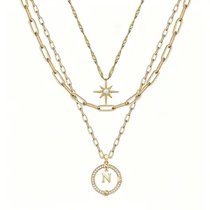 Collana multistrato retrò con ciondolo lettera bussola e ciondolo esagramma per donne.