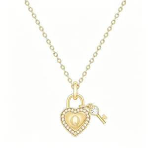Close-up detail of gold heart lock pendant necklace featuring sparkling pavé crystals and letter Q.
