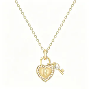 Closeup view of gold heart lock pendant necklace with sparkling crystal and letter R charm details.