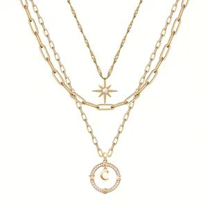 Collana girocollo multistrato dorata vintage con ciondolo stella e lettera bussola.