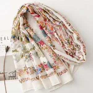 Detailed closeup view of French pastoral floral and bird print scarf with soft cotton fabric.