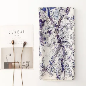Detail shot of the French pastoral floral bird print scarf, featuring exquisite blue and purple patterns.