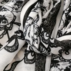 French vintage black and white floral print scarf detail view, elegant women's long shawl.