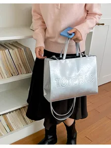 Elegante bolso tote metálico plateado para mujer, gran bolso de hombro para trabajo diario.