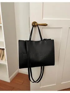 Bolso tote negro de gran capacidad en piel sintética para mujer, elegante bolso de hombro diario.