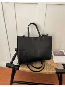 Bolso tote de cuero negro gran capacidad bolso de mano minimalista bandolera elegante