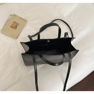 Elegante bolso tote negro clásico de cuero para mujer, bolso grande con asas dobles.