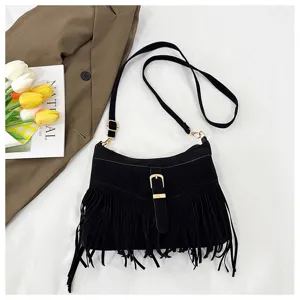 Black suede fringe shoulder bag, retro messenger bag with metal buckle and strap.