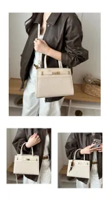 Vista de detalle de elegante bolso de mano de cuero beige con cierre metálico, bolso elegante.