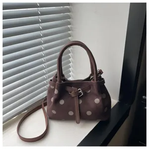 Borsa a tracolla marrone vintage a pois, vista dettagliata, elegante borsa in camoscio.