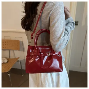 Red patent leather handbag detail, retro belt decor shoulder bag, stylish commuter bag
