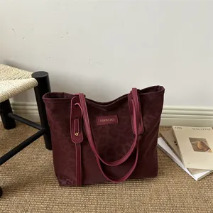 Burgundy tote bag for women, retro commuting large shoulder bag with subtle leopard print design.