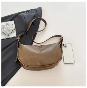 Borsa a tracolla marrone retrò alla moda da donna, borsa a mezzaluna casual chic ed elegante.
