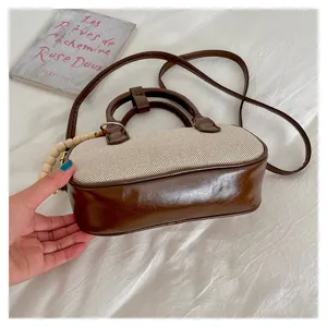 Bolso de hombro de barril de lona y cuero PU estilo coreano bolso cruzado casual de mujer