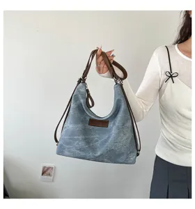 Borsa a tracolla hobo in tela denim vintage da donna, grande tote casual e zaino versatile.