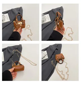 Mini bolso bandolera de cuero marrón con cadena dorada estilo elegante para uso diario