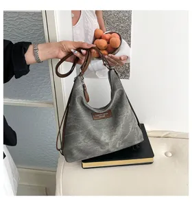 Borsa a tracolla hobo in tela vintage casual da donna, borsa tote elegante e capiente.