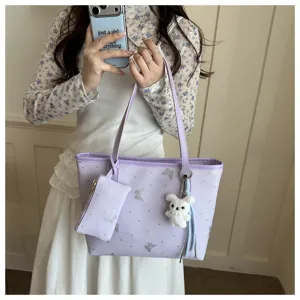 Borsa tote viola chiaro con farfalle glitterate, portamonete e grazioso ciondolo coniglio.
