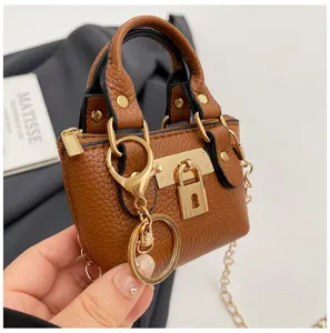 Mini bolso cruzado de cuero marrón con candado, elegante bolso de mano chic para mujeres.