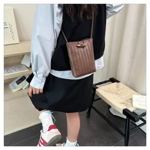 Mini woven crossbody bag for women, stylish soft leather shoulder phone bag with toggle.