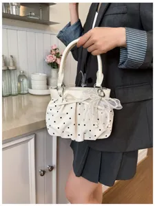 Korean style polka dot pleated handbag with bow and pearl mesh detail for women daily commute.